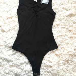 NWT! Wet seal body suit.